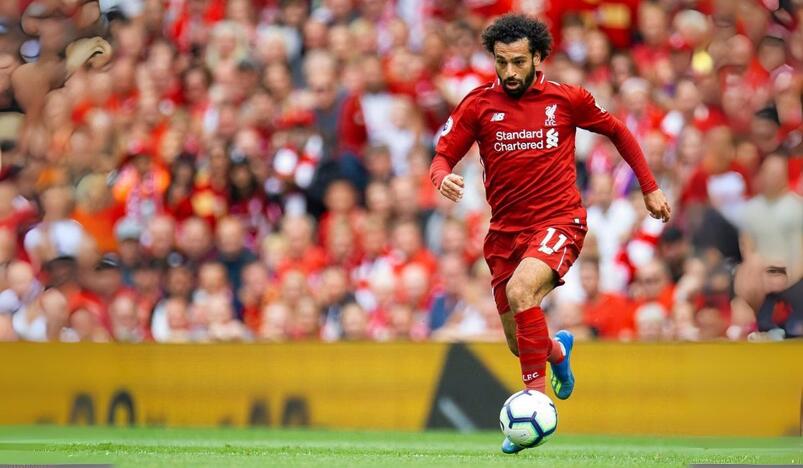 Mohamed Salah celebrates after winning PFA Player of the Year award